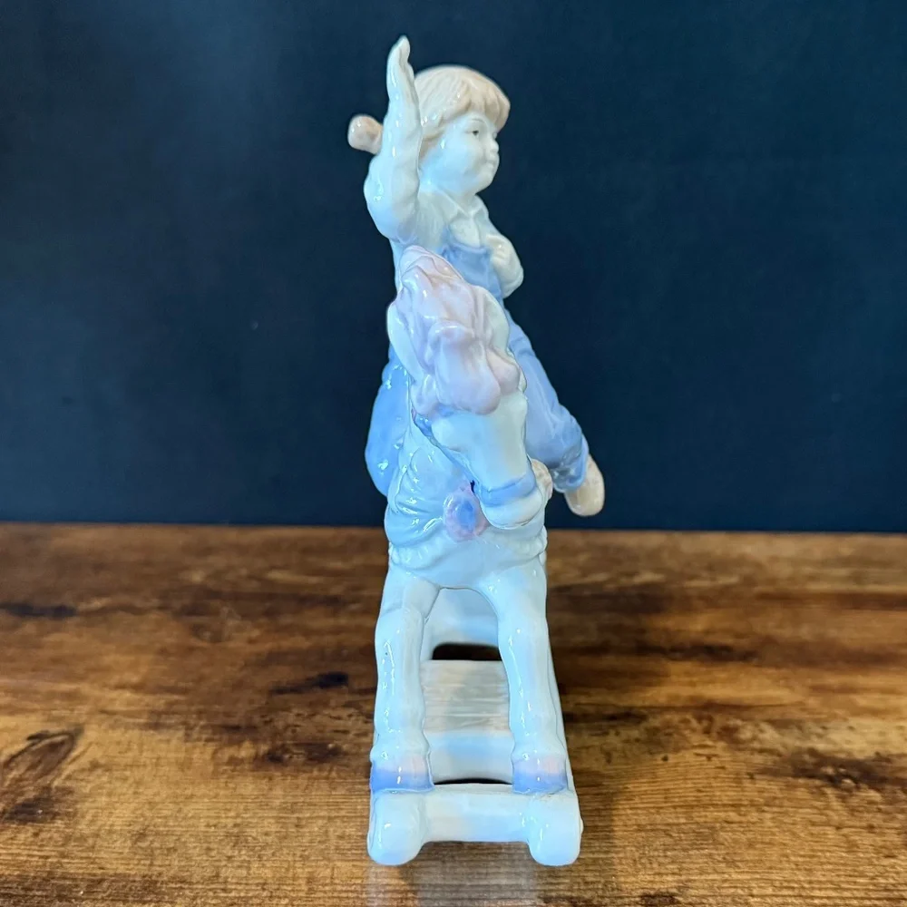 1991 MEICO PAUL SEBASTIAN Girl Riding Rocking Horse Figurine